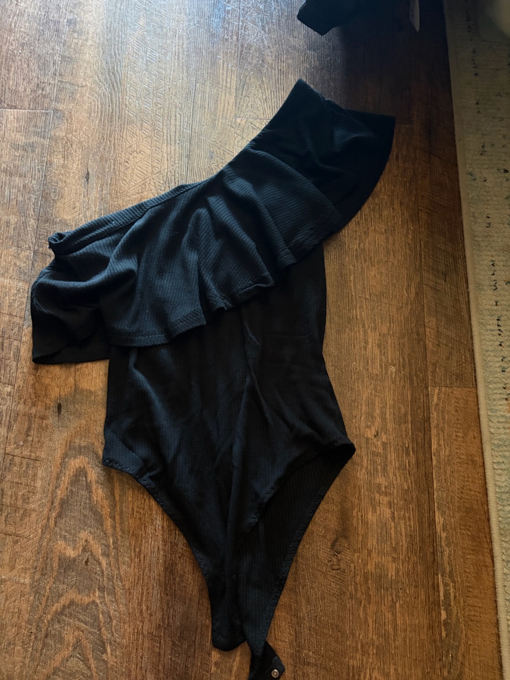 Black Ribbed One-Shoulder Bodysuit